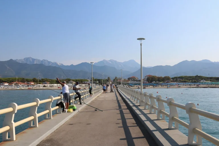 The pier of Forte dei Marmi with the Apuan Alps